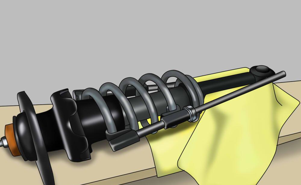 Méthode 1 sur 2 : abaisser une suspension à ressorts hélicoïdaux à l'aide de ressorts d'abaissement